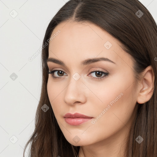 Neutral white young-adult female with long  brown hair and brown eyes