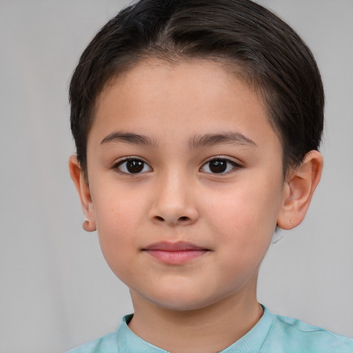 Joyful white child female with short  brown hair and brown eyes