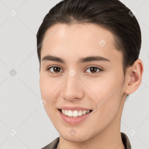 Joyful white young-adult female with medium  brown hair and brown eyes