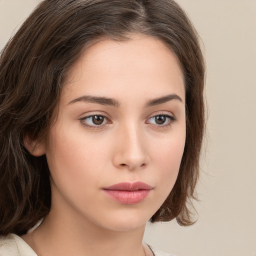 Neutral white young-adult female with medium  brown hair and brown eyes