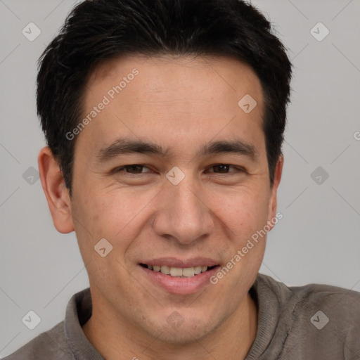 Joyful white adult male with short  brown hair and brown eyes