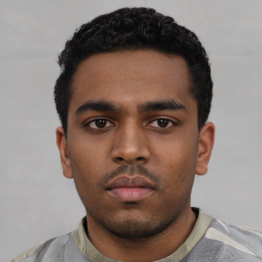 Neutral black young-adult male with short  black hair and brown eyes