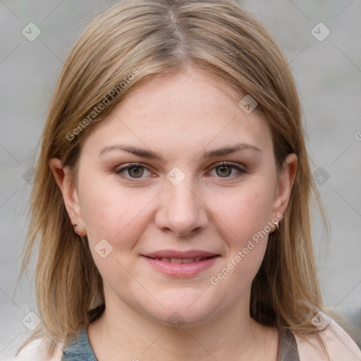 Joyful white young-adult female with medium  brown hair and blue eyes