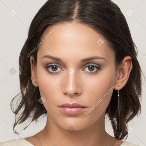 Neutral white young-adult female with medium  brown hair and brown eyes