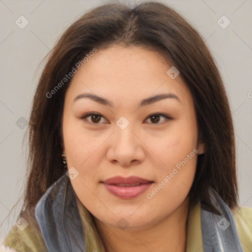 Joyful asian young-adult female with medium  brown hair and brown eyes