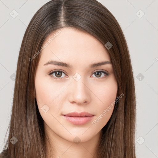 Neutral white young-adult female with long  brown hair and brown eyes