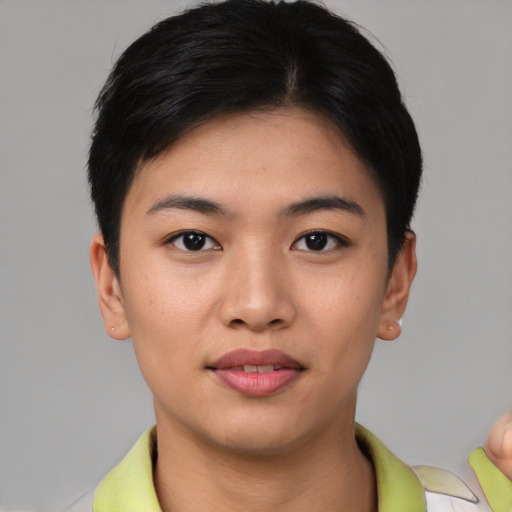 Joyful asian young-adult female with short  brown hair and brown eyes
