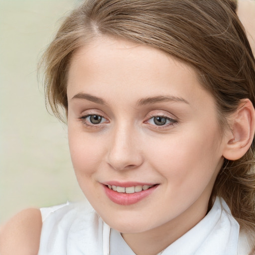 Joyful white young-adult female with long  brown hair and blue eyes