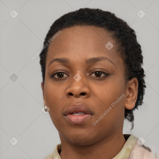 Neutral black young-adult female with short  brown hair and brown eyes