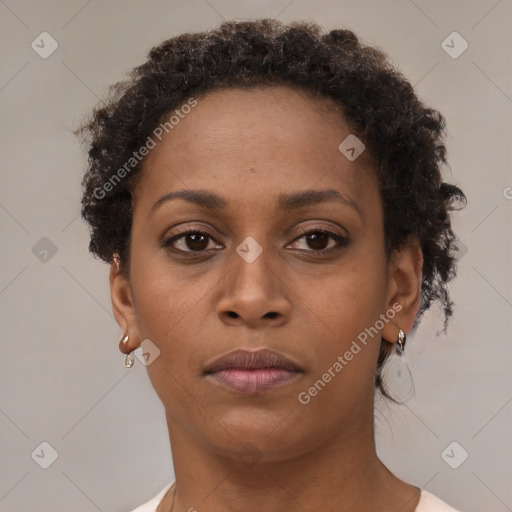 Neutral black young-adult female with short  brown hair and brown eyes