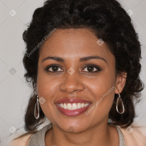 Joyful black young-adult female with medium  brown hair and brown eyes