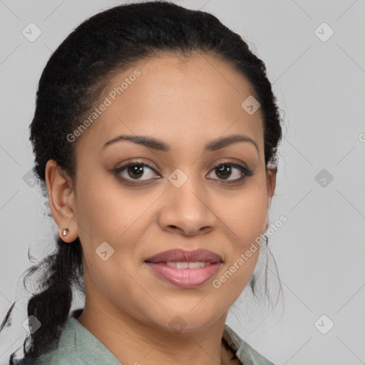 Joyful latino young-adult female with medium  brown hair and brown eyes