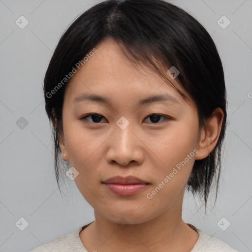 Neutral asian young-adult female with medium  brown hair and brown eyes