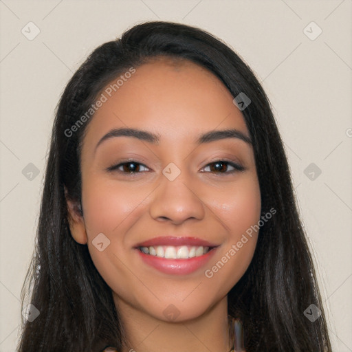 Joyful latino young-adult female with long  black hair and brown eyes