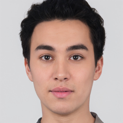 Neutral white young-adult male with short  black hair and brown eyes