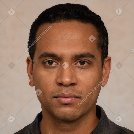 Neutral latino young-adult male with short  black hair and brown eyes