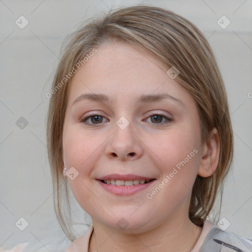 Joyful white young-adult female with medium  brown hair and blue eyes