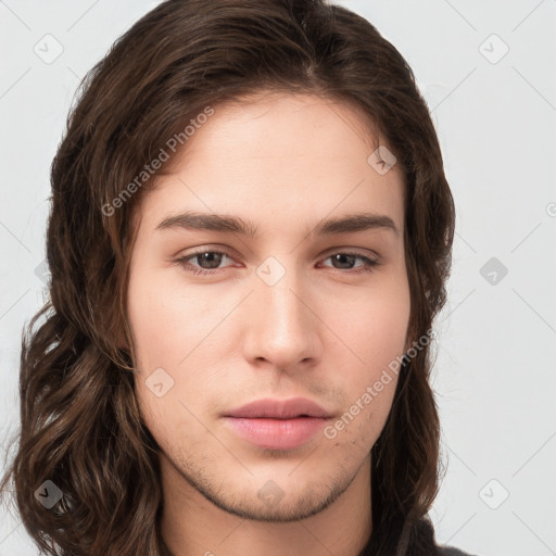 Neutral white young-adult female with long  brown hair and brown eyes