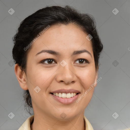 Joyful latino adult female with short  brown hair and brown eyes