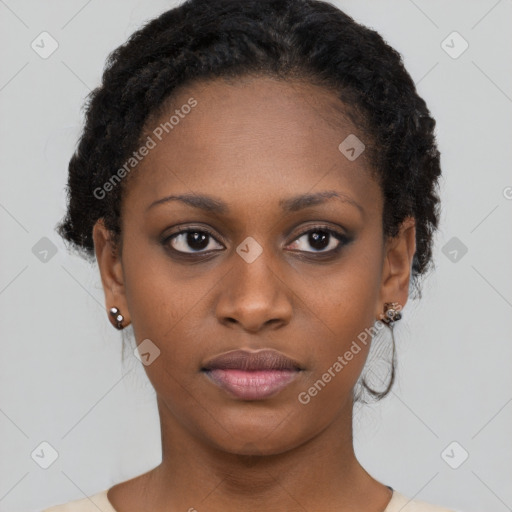 Neutral black young-adult female with short  brown hair and brown eyes