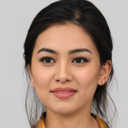 Joyful asian young-adult female with medium  brown hair and brown eyes