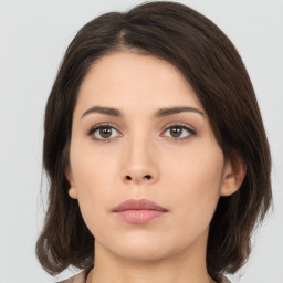 Neutral asian young-adult female with medium  brown hair and brown eyes