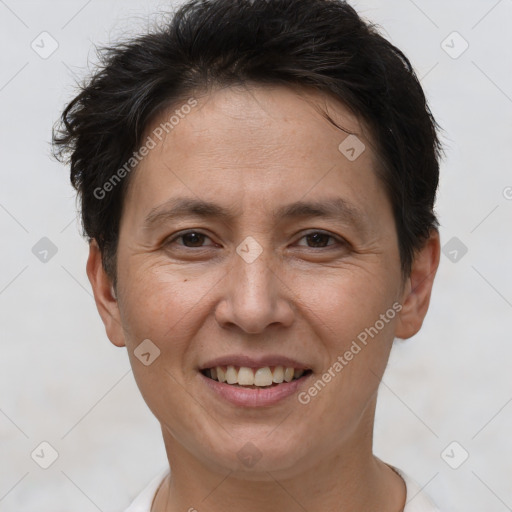 Joyful white adult female with short  brown hair and brown eyes