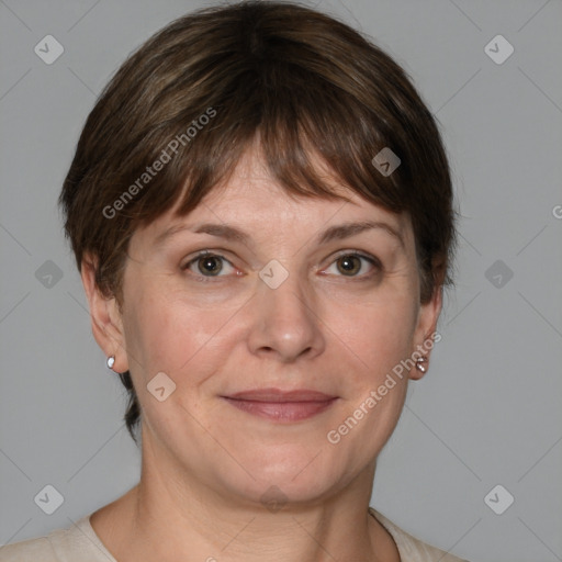 Joyful white adult female with medium  brown hair and grey eyes