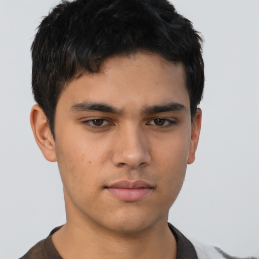 Neutral asian young-adult male with short  brown hair and brown eyes