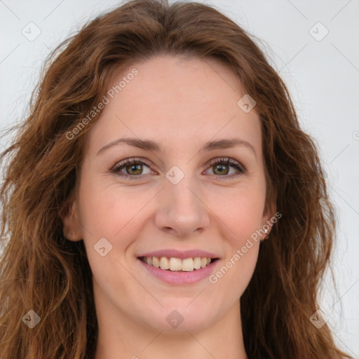 Joyful white young-adult female with long  brown hair and green eyes