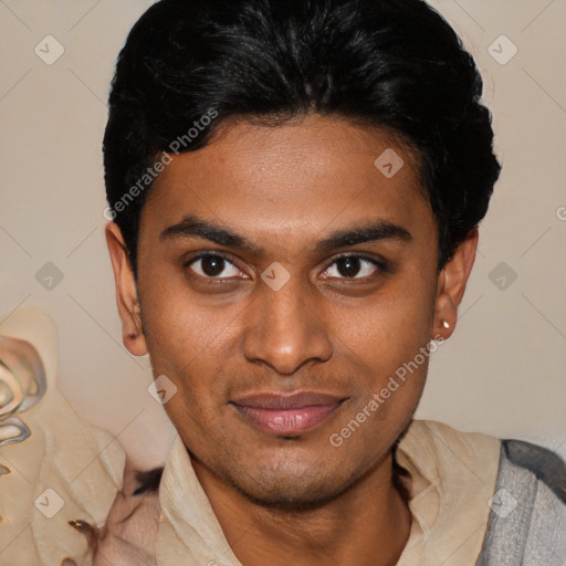 Joyful black young-adult male with short  black hair and brown eyes