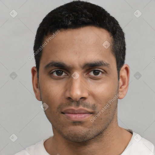 Neutral latino young-adult male with short  black hair and brown eyes