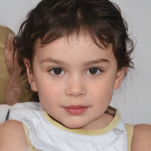 Joyful white child female with short  brown hair and brown eyes