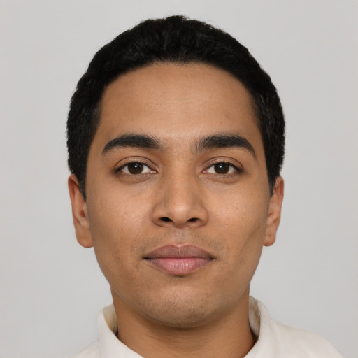 Neutral latino young-adult male with short  black hair and brown eyes