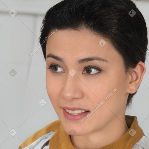 Joyful asian young-adult female with short  brown hair and brown eyes