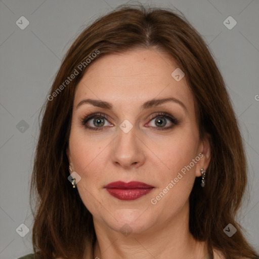 Joyful white young-adult female with long  brown hair and green eyes