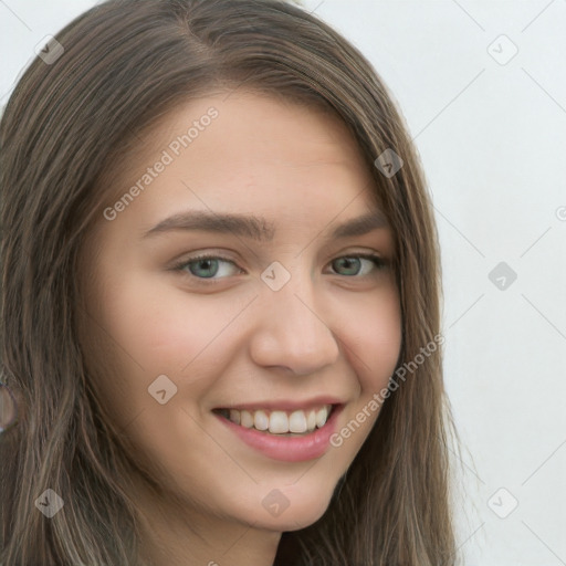 Joyful white young-adult female with long  brown hair and green eyes