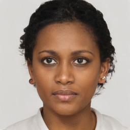 Neutral black young-adult female with short  brown hair and brown eyes