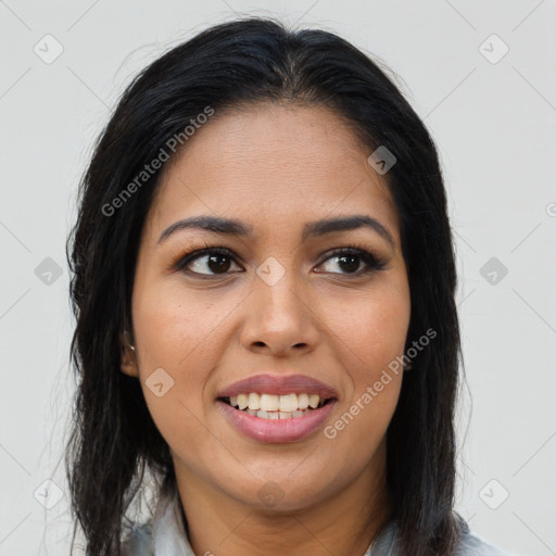 Joyful latino young-adult female with long  brown hair and brown eyes