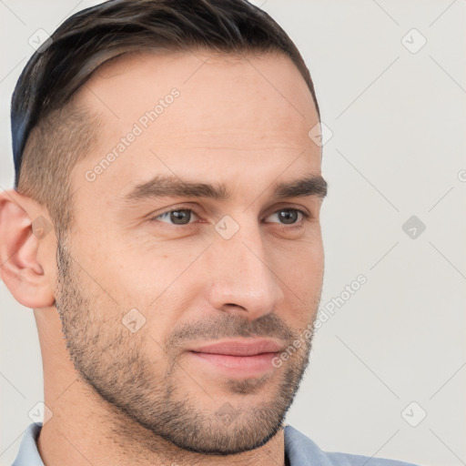 Joyful white young-adult male with short  brown hair and brown eyes