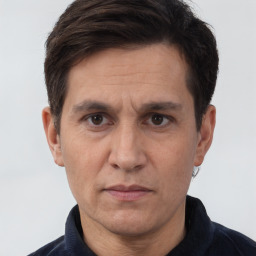 Neutral white adult male with short  brown hair and brown eyes