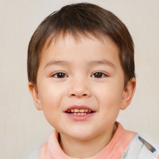 Joyful white child male with short  brown hair and brown eyes
