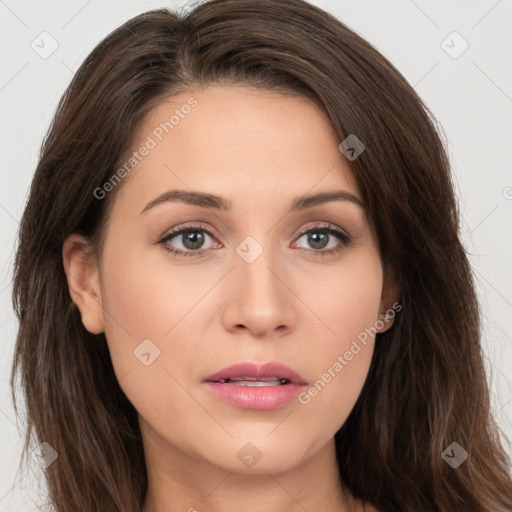 Neutral white young-adult female with long  brown hair and brown eyes