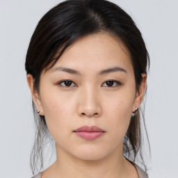 Neutral asian young-adult female with medium  brown hair and brown eyes