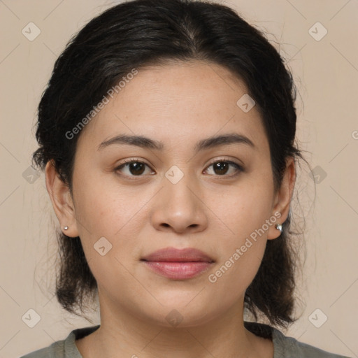 Joyful latino young-adult female with medium  brown hair and brown eyes