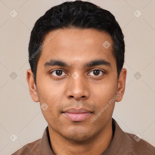 Neutral latino young-adult male with short  black hair and brown eyes