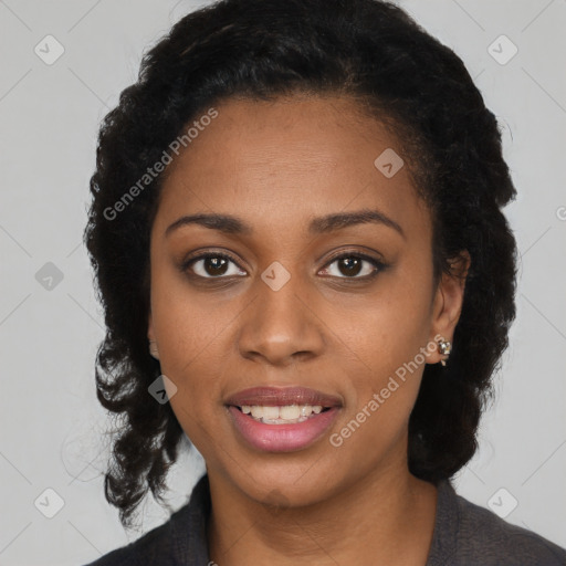 Joyful black young-adult female with long  black hair and brown eyes