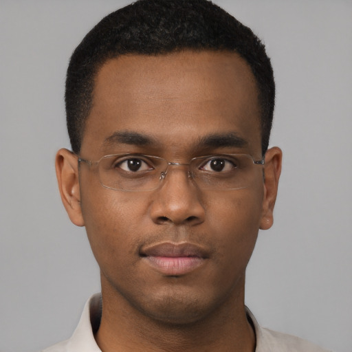 Neutral black young-adult male with short  black hair and brown eyes