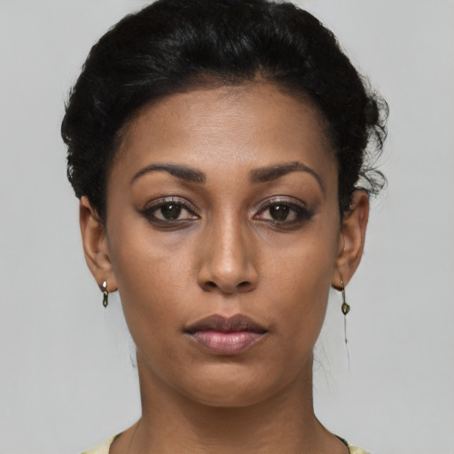 Neutral latino young-adult female with short  black hair and brown eyes