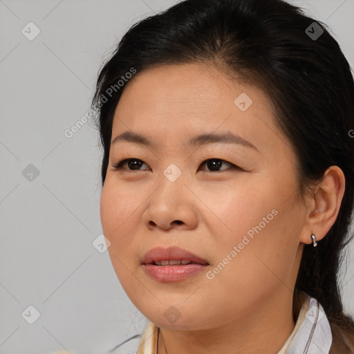 Joyful asian young-adult female with medium  brown hair and brown eyes